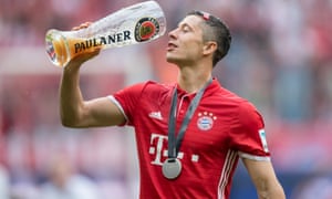 Lewandowski enjoys a drink after sealing the Bundesliga title in 2016