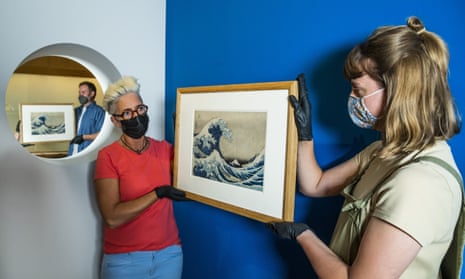 Two versions of Katsushika Hokusai's most celebrated print Under the Wave off Kanagawa (1831), popularly called The Great Wave before they are installed on the wall at the British Museum