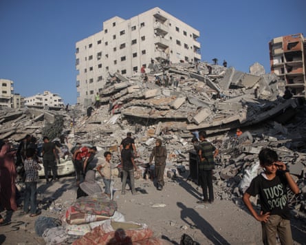 Palestinians inspect the damage after an Israeli airstrike in the Tel al-Hawa neighbourhood this week.