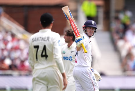 England’s Harry Brook (right) celebrates reaching a half century.