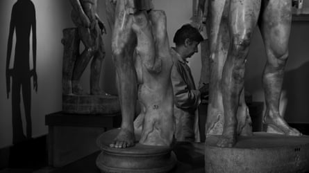 Maria tending to the museum sculptures.