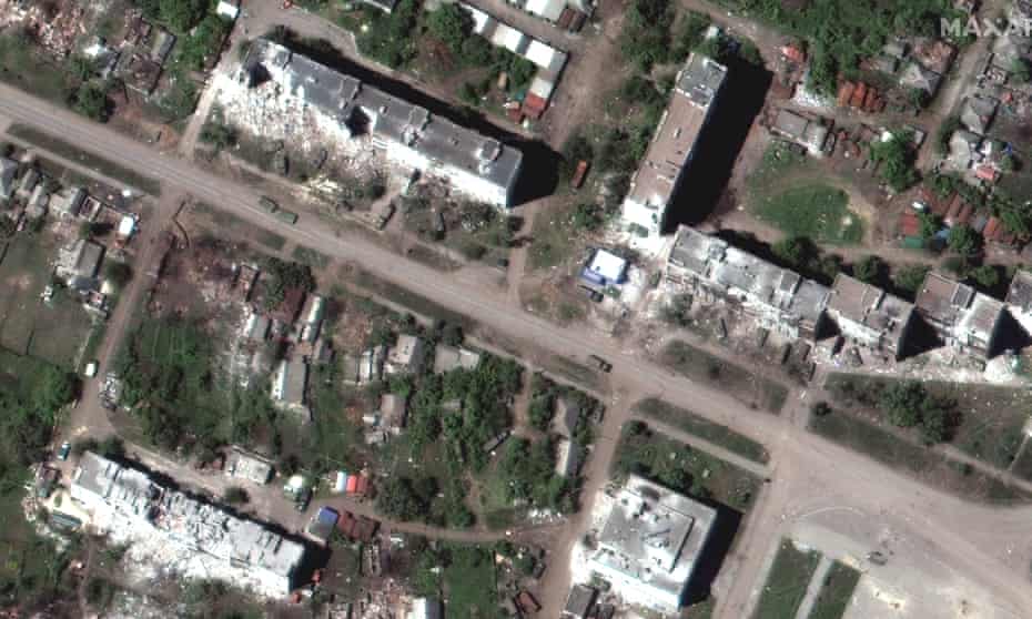 This satellite image provided by Maxar Technologies shows destroyed buildings, in Popasna, a town in Sievierodonetsk region, Ukraine.