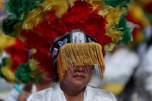 Saltillo, Mexico: people take part in the city’s international festival of the arts by performing the Matlachinada dance to start the parade to Santiago cathedral