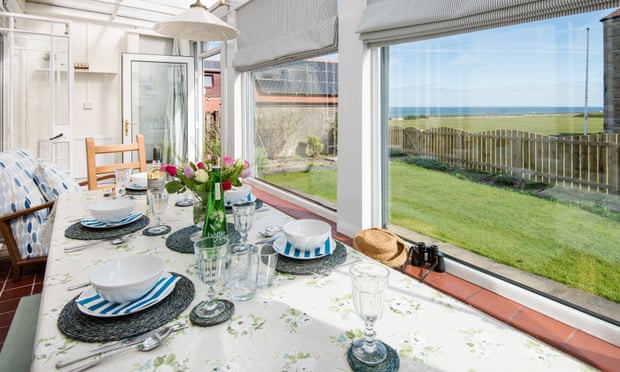 Dining table and sea view at the Tumblers
