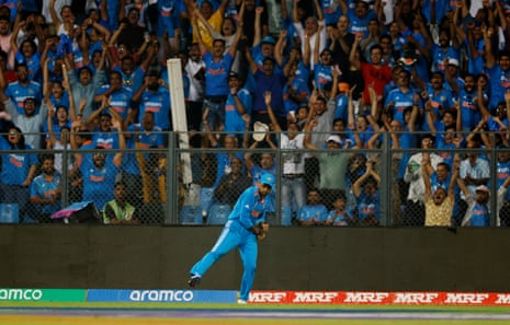 India's Suryakumar Yadav takes a catch to dismiss New Zealand's Kane Williamson
