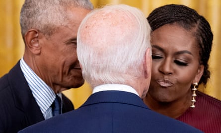 Michelle Obama kisses Joe Biden at the White House on 7 September.