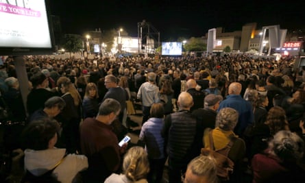 Hundreds of people gather for a protest in Tel Aviv, Israel, on Saturday night calling for the resumption of hostage negotiations.