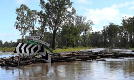 A flooded road near an overflowing Richmond river outside Lismore in northern NSW last month