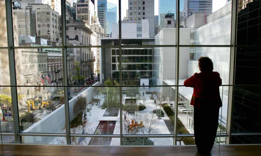 A visitor looks over the sculpture garden at New York’s Museum of Modern Art, located in a Manhattan tower block.