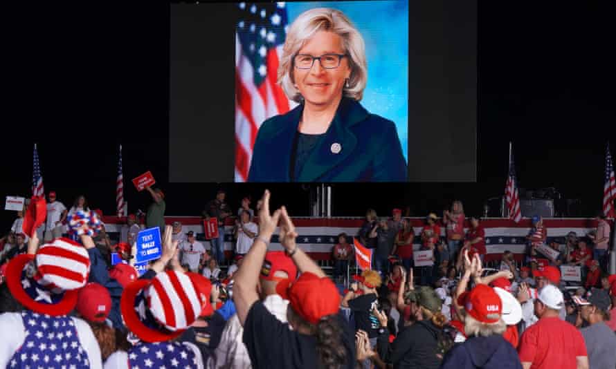 A doctored photo of Senator Liz Cheney with the face of former President George W Bush is shown on a jumbotron at a rally sponsored by ‘Save America’ in Perry, Georgia, on Saturday.