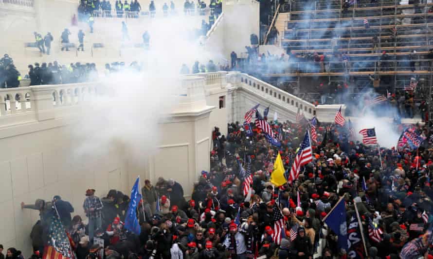 Supporters of U.S. President Donald Trump gather in Washington<br>Police release tear gas into a crowd of pro-Trump protesters during clashes at a rally to contest the certification of the 2020 U.S. presidential election results by the U.S. Congress, at the U.S. Capitol Building in Washington, U.S, January 6, 2021. REUTERS/Shannon Stapleton