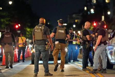 Homeland Security Investigations agents conduct traffic checks at a checkpoint along 14th Street in north-west Washington DC on 13 August 2025.