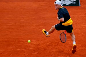 Diego Schwartzman returns the ball to Rafael Nadal.
