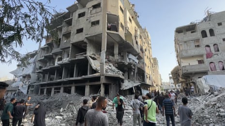 A view of the destruction after Israeli warplanes hit a building in the al-Shanti area of the northern Gaza Strip on Saturday.