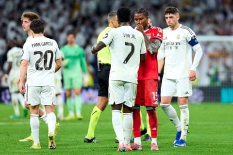 Sidny Lopes Cabral of Benfica with Real Madrid’s Vinícius Júnior