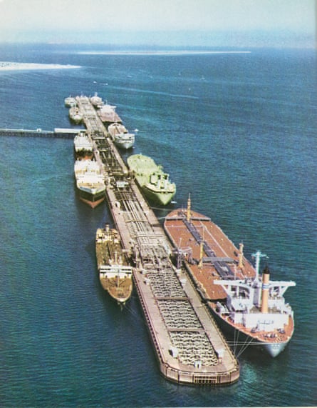 Tankers dock either side of a floating dock.