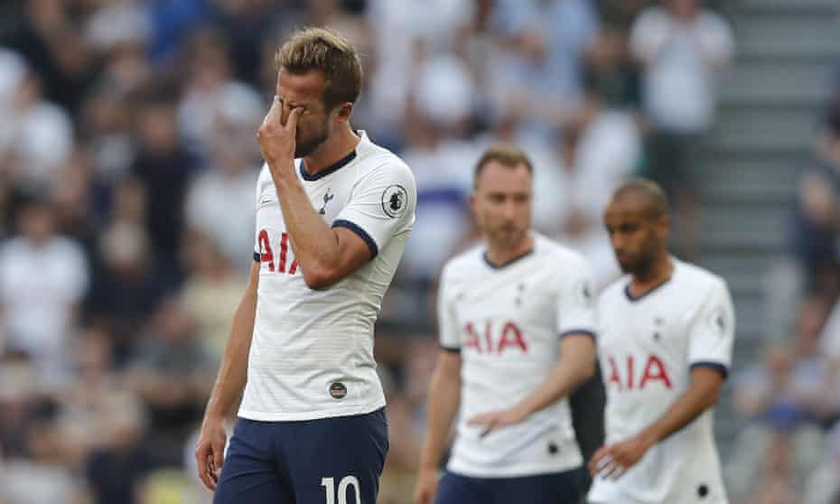 Tottenham’s Harry Kane, left, is left dejected after losing at home to Newcastle.