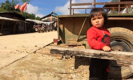 A child in Padangshang, an isolated hilltop hamlet in south-west China.