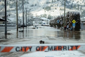 Flood waters cover neighbourhoods after severe rain prompted the evacuation of Merritt.