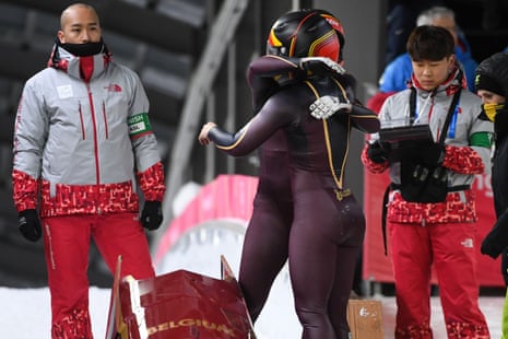 Belgium’s An Vannieuwenhuyse and Belgium’s Sophie Vercruyssen take the lead in the women’s bobsleigh.