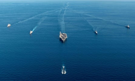 The USS Ronald Reagan aircraft carrier participates in a joint anti-submarine drill in waters off South Korea on Sept. 30, 2022.