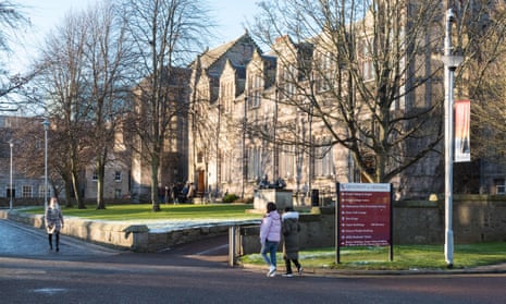 People walk past Aberdeen University buildings