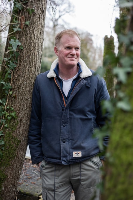 Sam Peters leaning against a tree