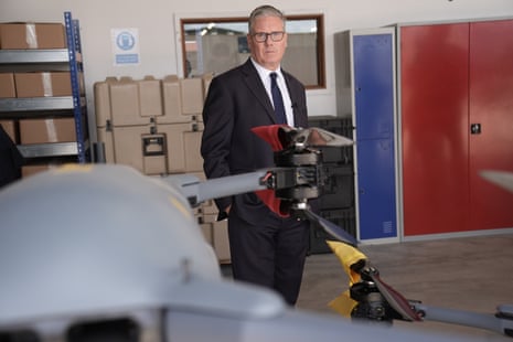 Keir Starmer looking at drones after delivering his speech on the Dip at Malloy Aeronautics, a drone company, in Berkshire