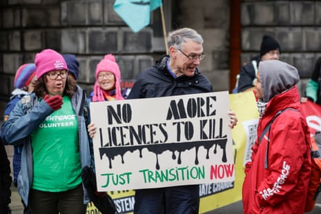 Climate activists, Greenpeace and Uplift hold a demonstration with climate activists outside the Scottish Court of Session (12 November 2024) as the first day of the Rosebank and Jackdaw judicial review hearing begins.