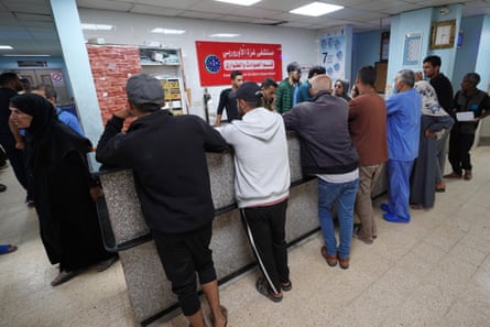 Palestinians wait for medical care at the European hospital in Khan Yunis last week