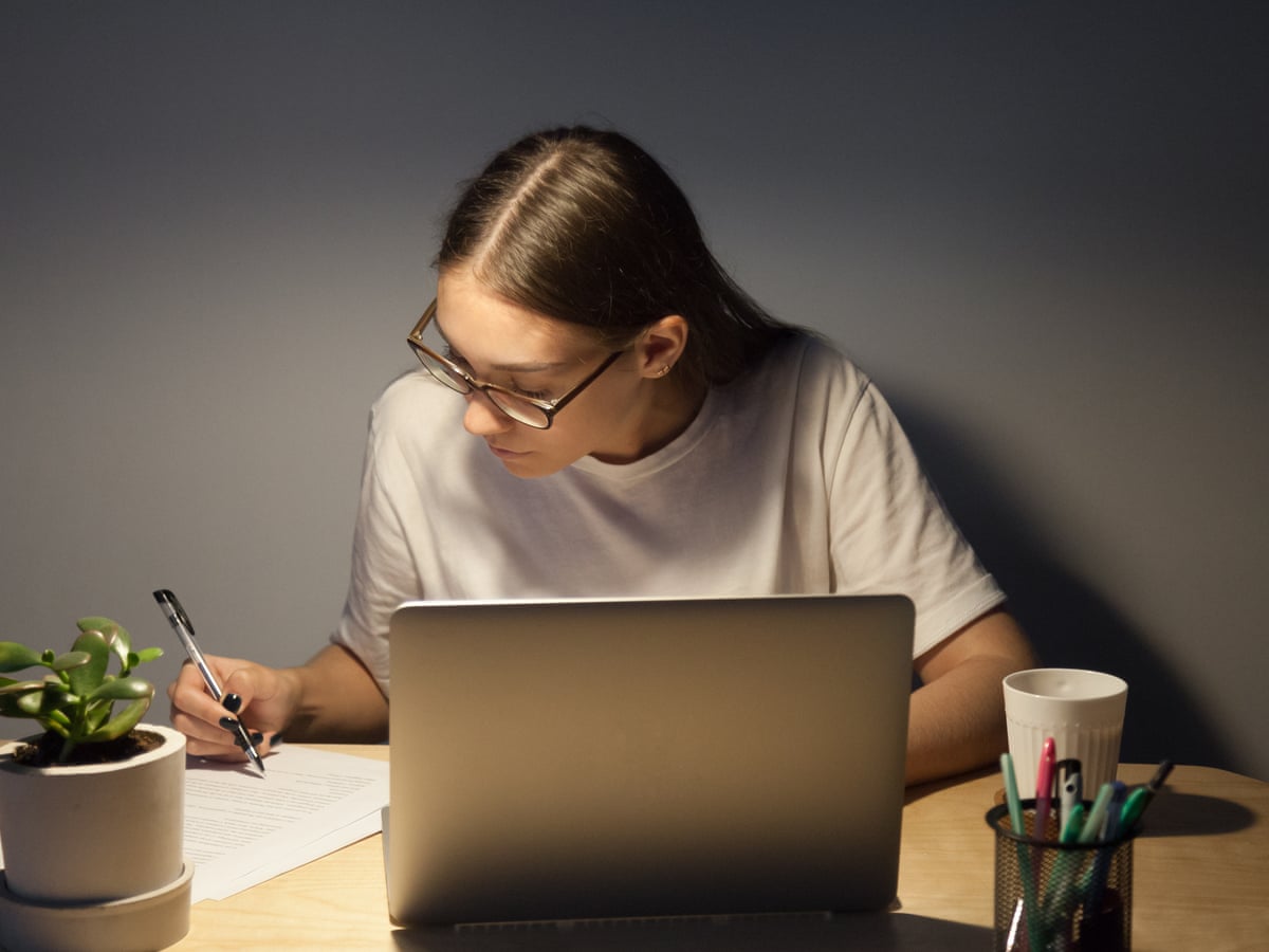 Business aspirant taking notes to learn 