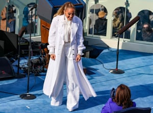 Jennifer Lopez in white Chanel, greeting Kamala Harris