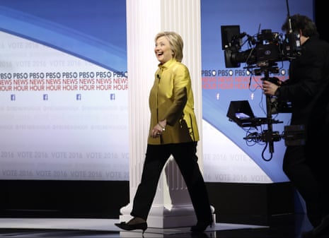 Hillary Rodham Clinton takes the stage before the Democratic presidential primary debate.