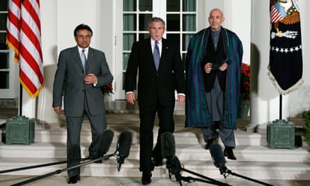 President Pervez Musharraf, left, with President George W Bush, centre, and Afghanistan’s President Hamid Karzai before giving a statement in the White House Rose Garden, Washington, in 2006.