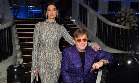 Cold Heart singers Elton John and Dua Lipa at John’s annual Aids Foundation Academy Awards viewing party in April.
