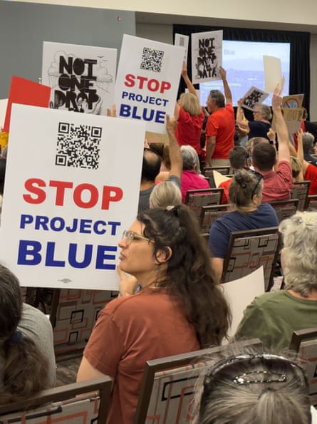 a women holding a sign