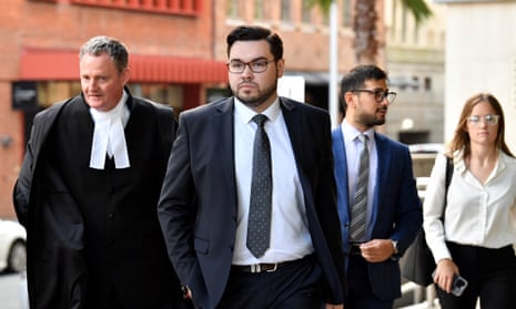 Bruce Lehrmann (centre) arrives at the federal court of Australia.
