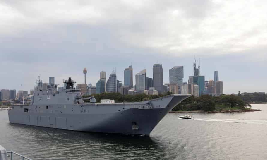 HMAS Adelaide departs Fleet Base East at Garden Island, Sydney, Australia