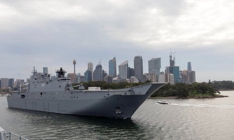 HMAS Adelaide departs Fleet Base East at Garden Island, Sydney, Australia, for Brisbane in preparation to provide disaster relief and assistance to Tonga.