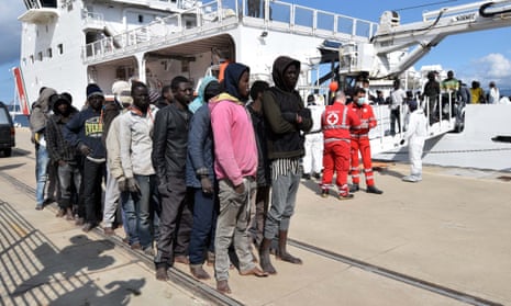 Migrants and refugees arrive in the port of Messina following a rescue operation at sea by the Italian Coast Guard ship “Diciotti” in 2016 in Sicily.