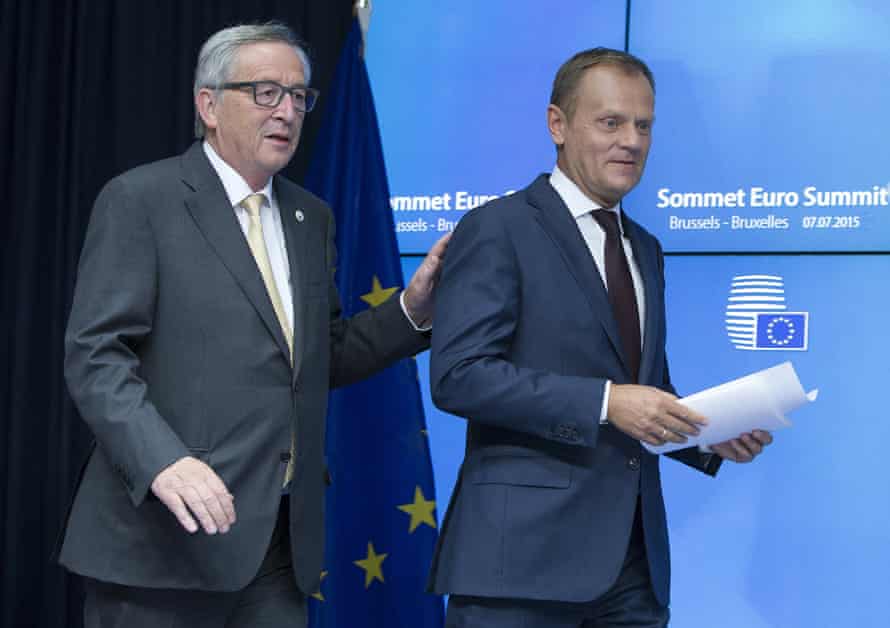 European Commission President Juncker and European Council President Tusk arrive at a news conference in Brussels.