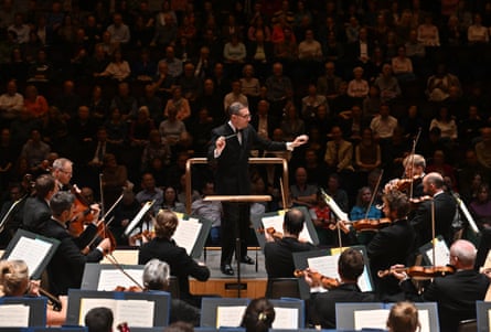 John Wilson conducts the Sinfonia of London in the Barbican Hall, 2024.