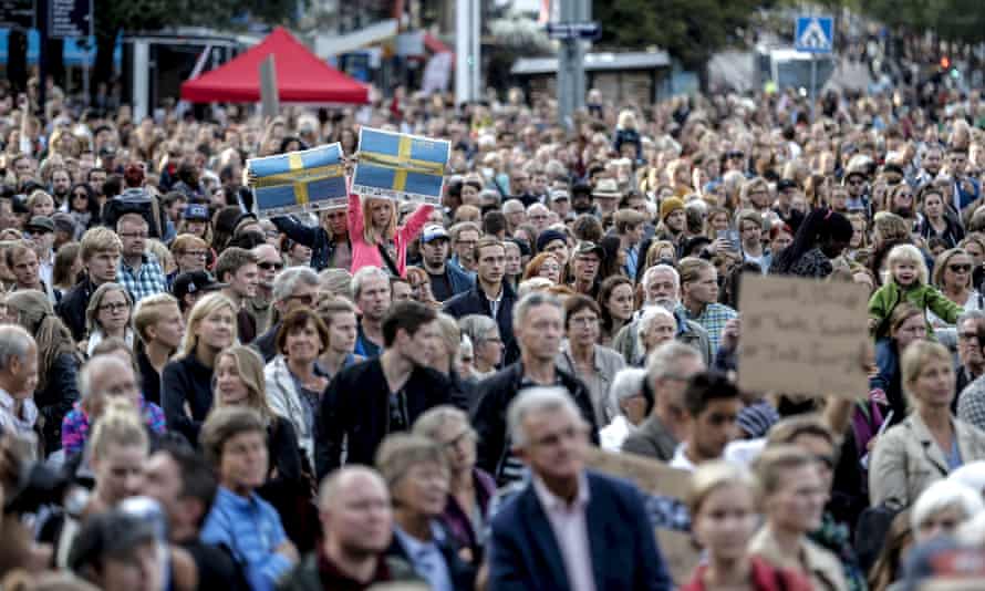 People attend a ‘Refugees Welcome’ demonstration in Gothenburg in September 2015