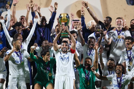Al-Hilal’s Salem Al-Dawsari lifts the trophy after their 4-1 Saudi Super Cup win over Al-Nassr