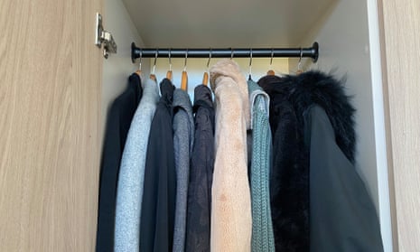 Winter coats hanging in a closet