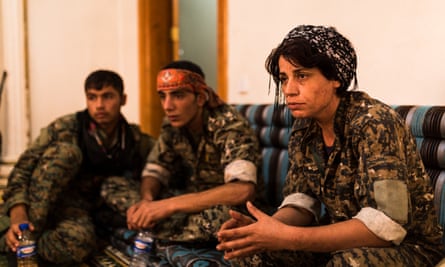 Hevda, right, at the base in Raqqa Samra.