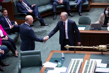 The Prime Minister Anthony Albanese shakes hands with Opposition leader Peter Dutton after they both delivered end of year valedictory speeches