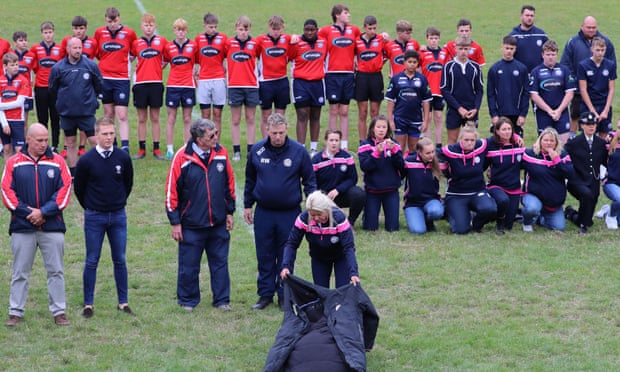 Players observe a minute’s silence at East Grinstead rugby club, Kent, to pay respects to Matt Ratana who was the club’s head coach.