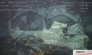 The windscreen and cockpit area of the wreckage of the plane