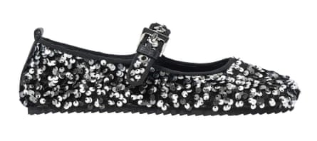 silver sequin on black ballerinas with a strap and buckle